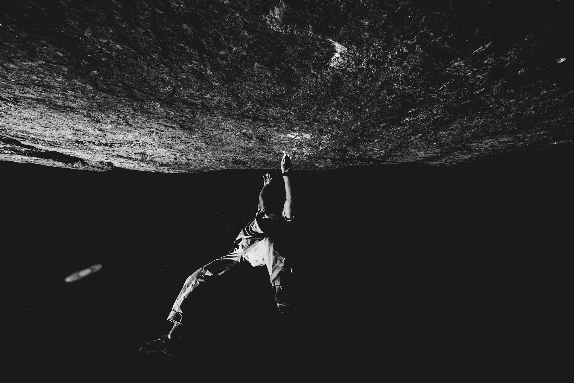 Climbing on a boulder