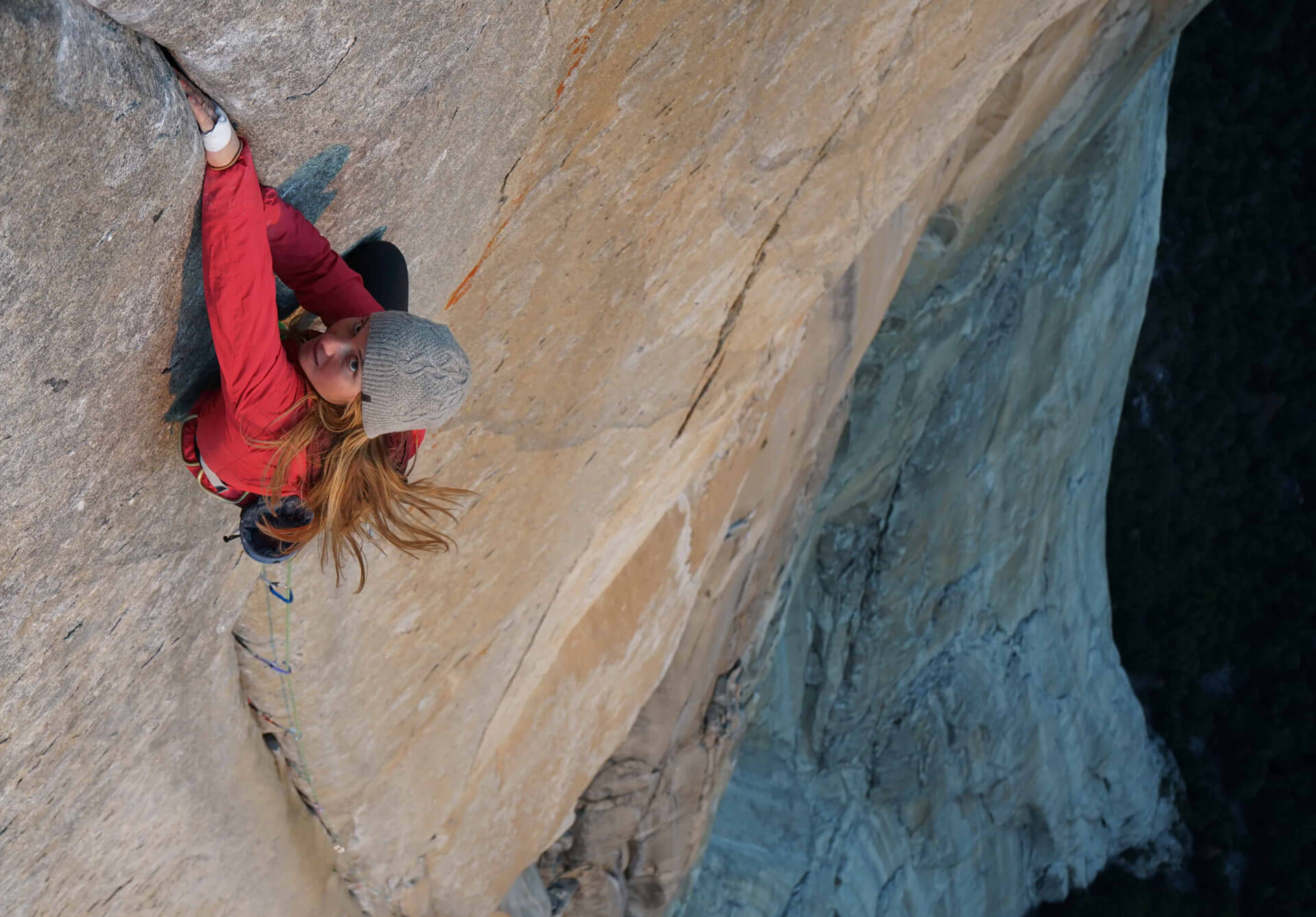 Hazel Findlay climbing a steep rock face