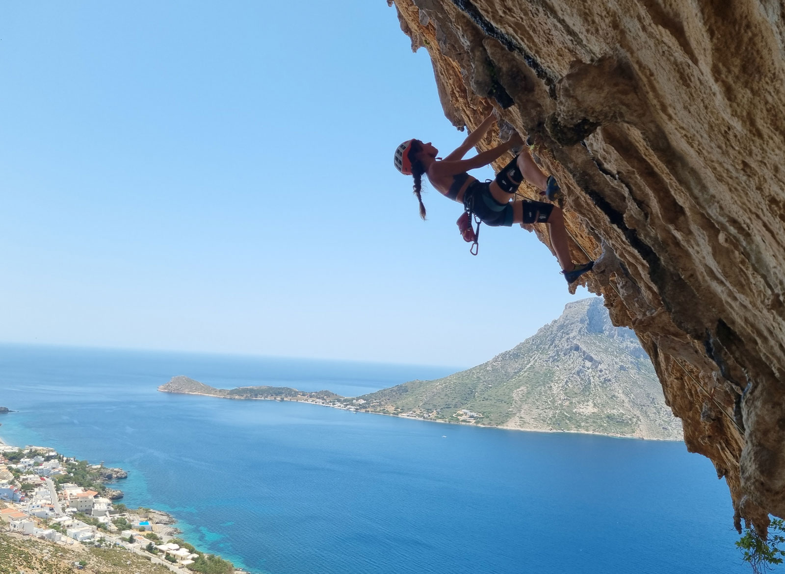 Climber on a steep rock face